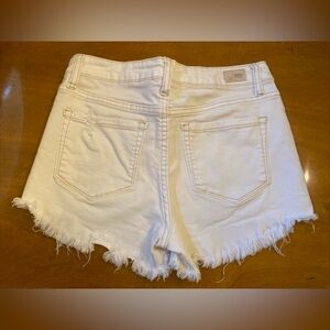 Tillys, RSQ, high waisted off white jean distressed cut-off shorts. Size 25